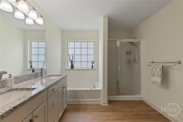 175 Willow Point Cir, Savannah, GA 31407 - full bathroom with a shower stall, wood finished floors, a garden tub, and double vanity