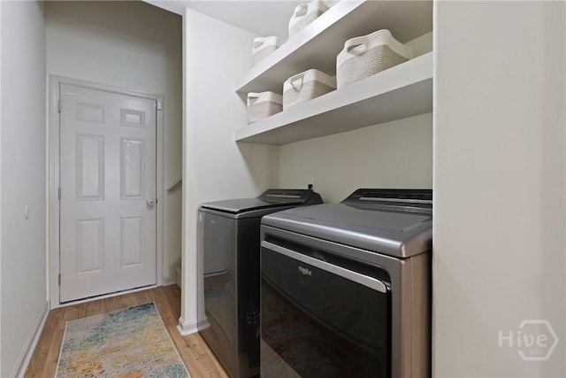 175 Willow Point Cir, Savannah, GA 31407 - washroom featuring washing machine and dryer and light wood-type flooring