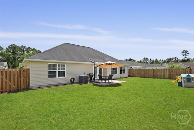 175 Willow Point Cir, Savannah, GA 31407 - back of house featuring a fenced backyard, a patio, and a playground