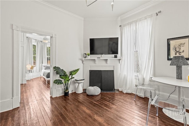 1212 Price St, Savannah, GA 31401 - living area featuring hardwood / wood-style floors, ornamental molding, and a fireplace