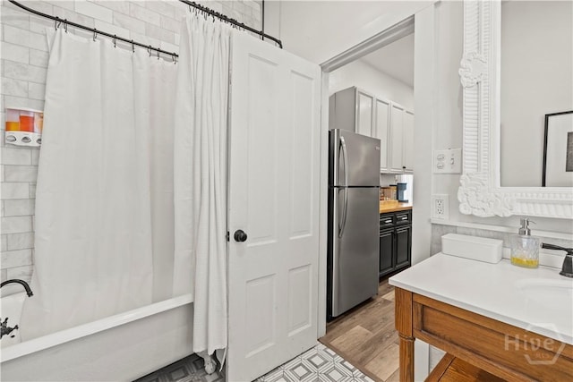 1212 Price St, Savannah, GA 31401 - kitchen with freestanding refrigerator and light countertops