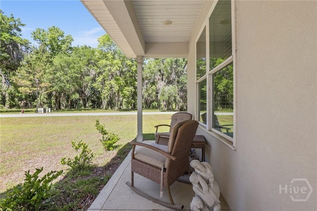1003 Dolphin Ct, Townsend, GA 31331 - view of patio with view of wooded area
