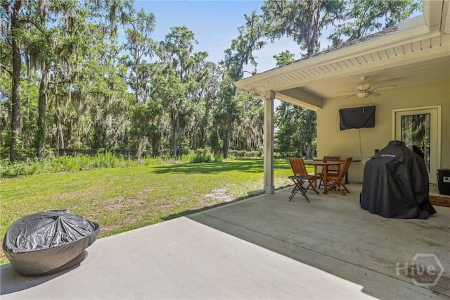 1003 Dolphin Ct, Townsend, GA 31331 - view of patio with ceiling fan and outdoor dining space