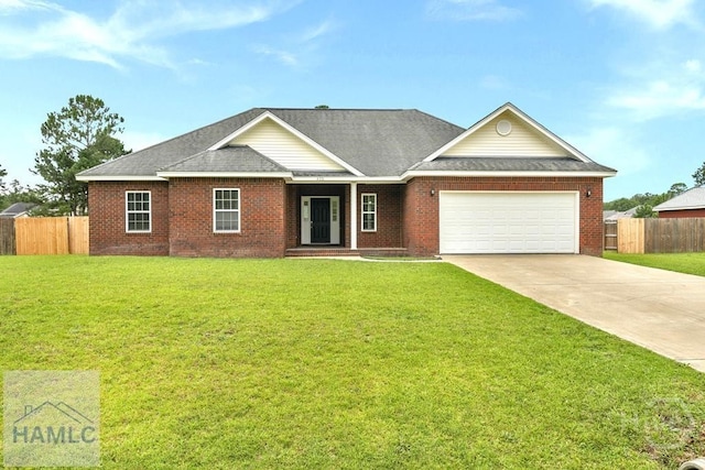 432 Cypress Creek Dr NE, Ludowici, GA 31316 - view of front of home featuring a garage, driveway, brick siding, and roof with shingles