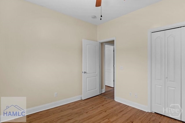432 Cypress Creek Dr NE, Ludowici, GA 31316 - unfurnished bedroom with light wood-style flooring, a closet, and ceiling fan
