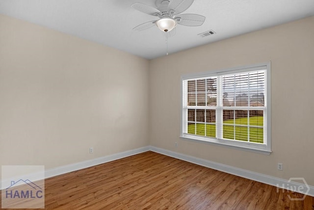 432 Cypress Creek Dr NE, Ludowici, GA 31316 - spare room with healthy amount of natural light, wood finished floors, and ceiling fan
