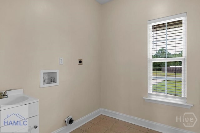 432 Cypress Creek Dr NE, Ludowici, GA 31316 - laundry area featuring electric dryer hookup, hookup for a washing machine, and light tile patterned floors