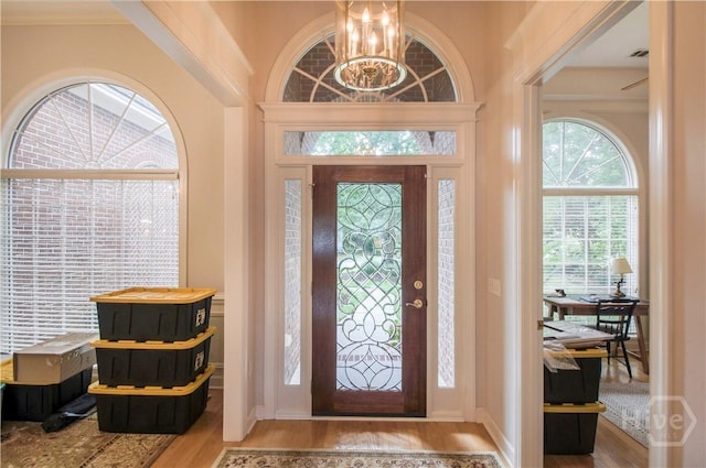 39 Grand Lake Cir, Savannah, GA 31405 - foyer entrance featuring wood finished floors and a chandelier