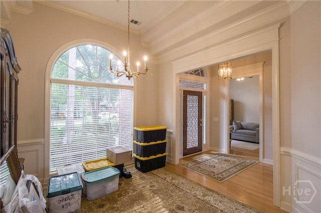 39 Grand Lake Cir, Savannah, GA 31405 - entryway with a chandelier, crown molding, and wood finished floors