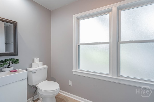 177 E Burkhalter St, Pembroke, GA 31321 - half bath featuring toilet and baseboards