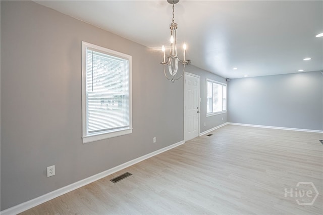 177 E Burkhalter St, Pembroke, GA 31321 - spare room featuring a chandelier, light wood-type flooring, and recessed lighting