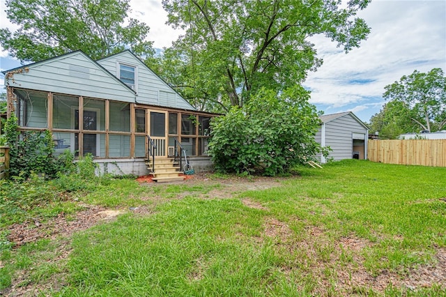 177 E Burkhalter St, Pembroke, GA 31321 - back of house featuring a sunroom