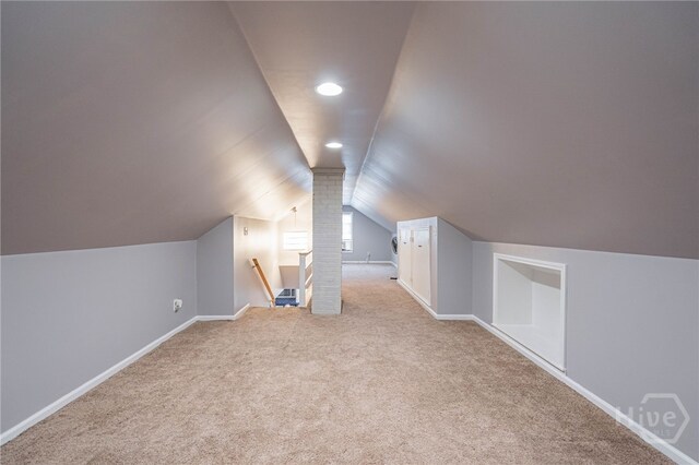 177 E Burkhalter St, Pembroke, GA 31321 - additional living space featuring vaulted ceiling, carpet, and recessed lighting