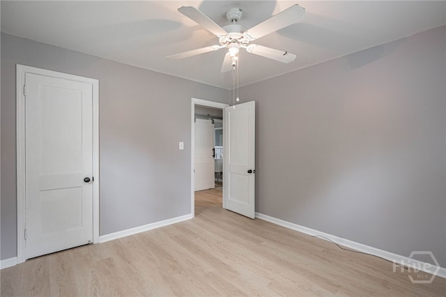 177 E Burkhalter St, Pembroke, GA 31321 - unfurnished bedroom featuring light wood finished floors and a ceiling fan