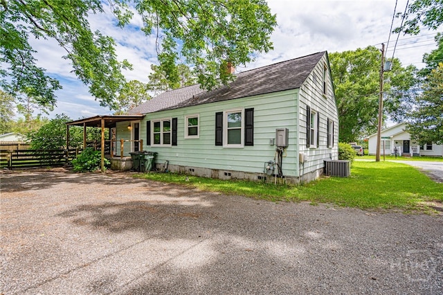 177 E Burkhalter St, Pembroke, GA 31321 - view of front of home featuring crawl space, a shingled roof, and a chimney