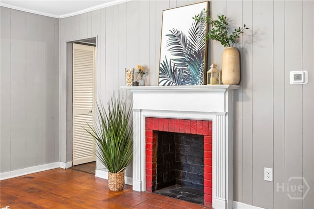 1915 Hawthorne St, Savannah, GA 31404 - detailed view of crown molding, wood finished floors, and a fireplace