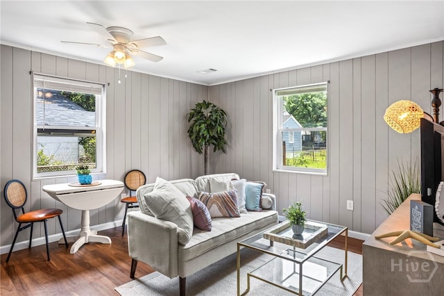 1915 Hawthorne St, Savannah, GA 31404 - living area featuring healthy amount of natural light, wood finished floors, and ceiling fan