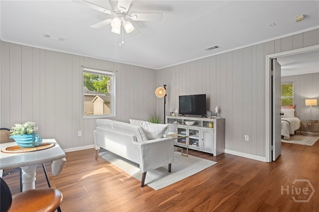 1915 Hawthorne St, Savannah, GA 31404 - living room with ceiling fan, wood finished floors, and ornamental molding