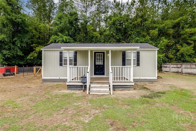 251 Old Louisville Rd, Guyton, GA 31312 - manufactured / mobile home with a porch