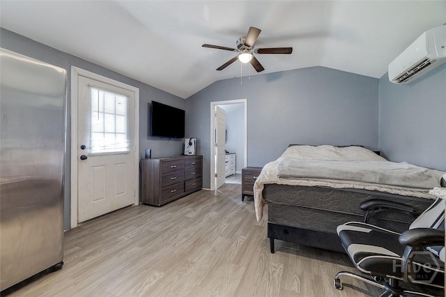 251 Old Louisville Rd, Guyton, GA 31312 - bedroom with a wall unit AC, light wood-style floors, lofted ceiling, and a ceiling fan