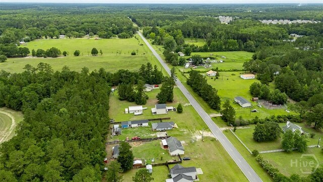 251 Old Louisville Rd, Guyton, GA 31312 - aerial overview of property's location with a heavily wooded area
