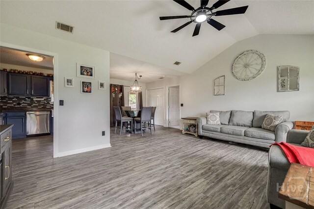 251 Old Louisville Rd, Guyton, GA 31312 - living area featuring a ceiling fan, dark wood-style flooring, and lofted ceiling