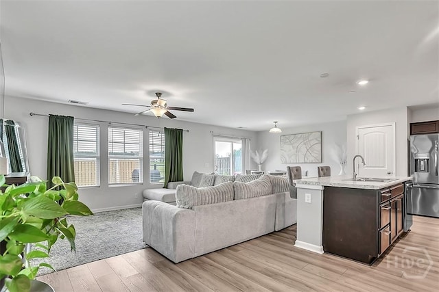 72 Marsh Salt Ln, Port Wentworth, GA 31407 - living room with light wood-style floors, ceiling fan, and recessed lighting