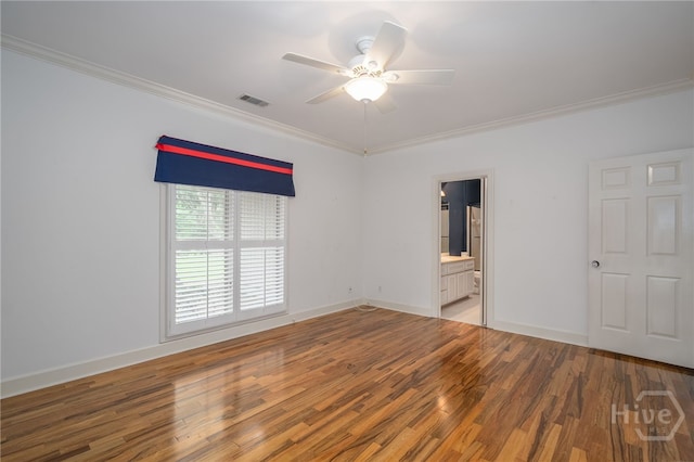 4 Hedgewood Ln, Savannah, GA 31411 - unfurnished bedroom with light wood-style floors, crown molding, connected bathroom, and a ceiling fan