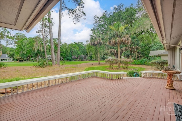 4 Hedgewood Ln, Savannah, GA 31411 - wooden deck featuring view of scattered trees and a yard