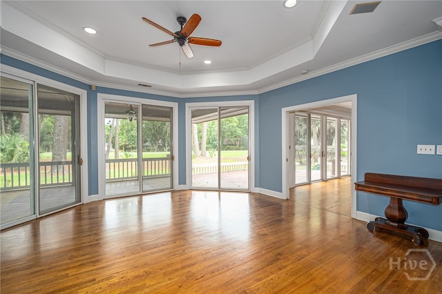 4 Hedgewood Ln, Savannah, GA 31411 - spare room with ceiling fan, wood finished floors, a raised ceiling, ornamental molding, and recessed lighting