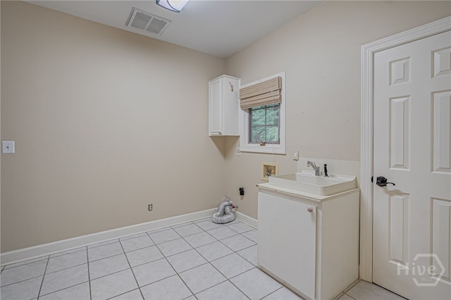 4 Hedgewood Ln, Savannah, GA 31411 - washroom featuring hookup for a washing machine, light tile patterned floors, and cabinet space