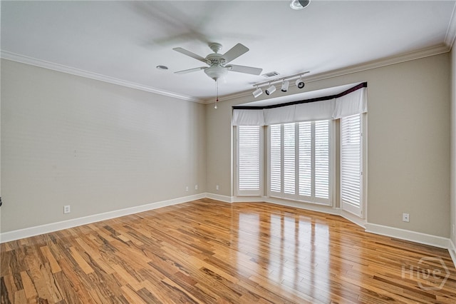 4 Hedgewood Ln, Savannah, GA 31411 - empty room featuring a ceiling fan, light wood-style flooring, track lighting, and crown molding
