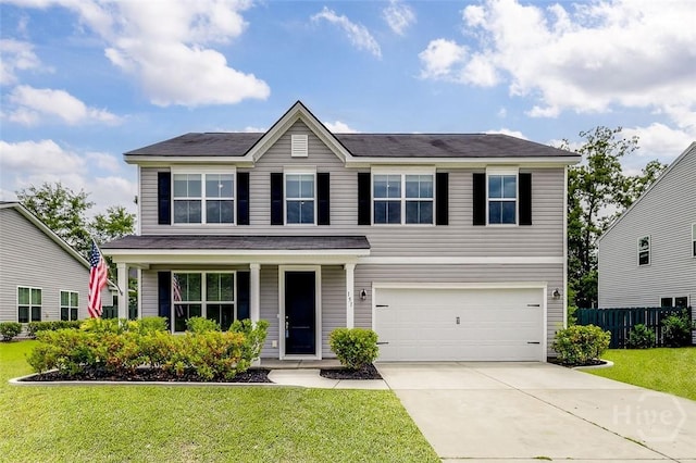 151 Excel Dr, Richmond Hill, GA 31324 - view of front of property featuring a garage and concrete driveway