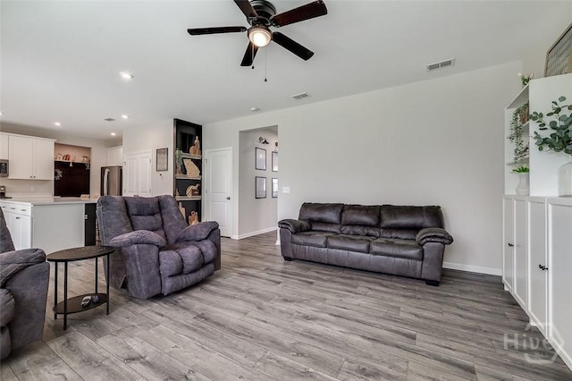 151 Excel Dr, Richmond Hill, GA 31324 - living area with light wood finished floors, a ceiling fan, and recessed lighting