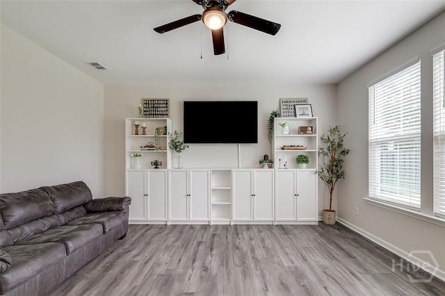 151 Excel Dr, Richmond Hill, GA 31324 - living room featuring light wood-style floors and ceiling fan