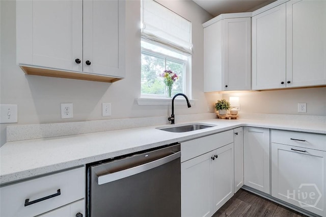 151 Excel Dr, Richmond Hill, GA 31324 - kitchen featuring stainless steel dishwasher, white cabinets, light stone countertops, and dark wood-style flooring