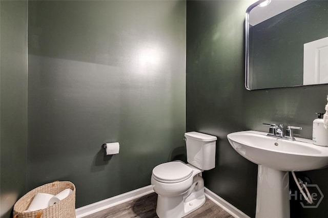 151 Excel Dr, Richmond Hill, GA 31324 - half bath featuring wood finished floors