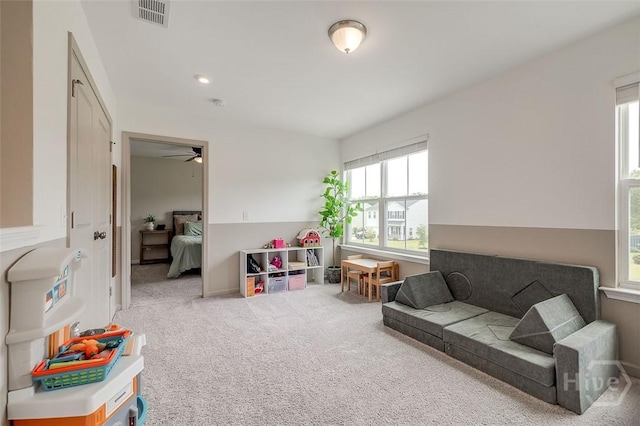 151 Excel Dr, Richmond Hill, GA 31324 - rec room with carpet and a ceiling fan
