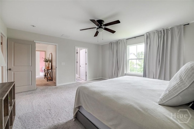 151 Excel Dr, Richmond Hill, GA 31324 - carpeted bedroom featuring baseboards and a ceiling fan