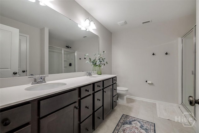 151 Excel Dr, Richmond Hill, GA 31324 - full bath featuring a stall shower, double vanity, and tile patterned flooring