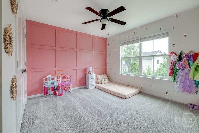 151 Excel Dr, Richmond Hill, GA 31324 - bedroom featuring a decorative wall, carpet flooring, and a ceiling fan