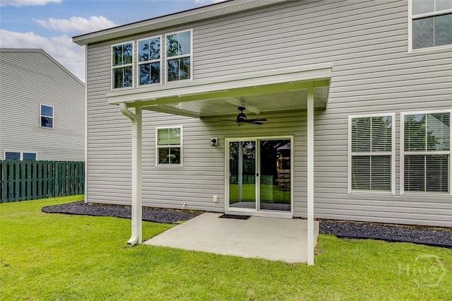 151 Excel Dr, Richmond Hill, GA 31324 - rear view of house featuring a ceiling fan and a patio