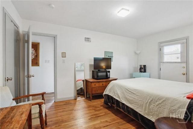2104 Mason Dr, Savannah, GA 31404 - bedroom featuring light wood-style floors and baseboards