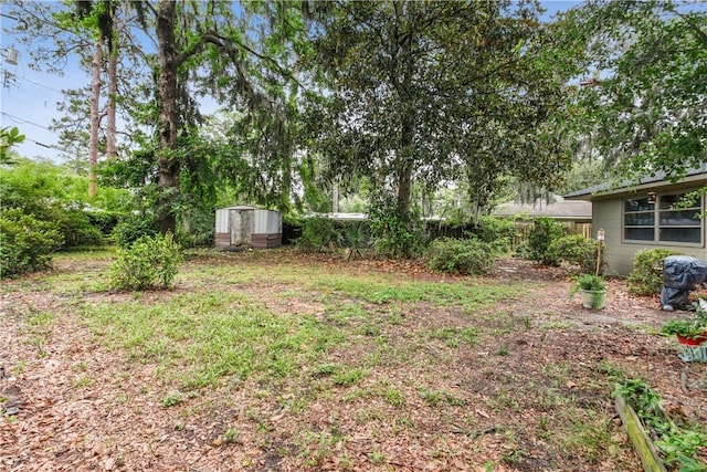 2104 Mason Dr, Savannah, GA 31404 - view of yard featuring a shed