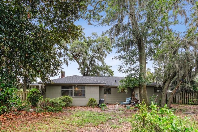 2104 Mason Dr, Savannah, GA 31404 - back of house with roof with shingles and a chimney
