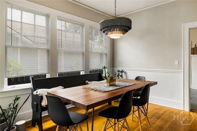 316 E 51st St, Savannah, GA 31405 - dining room with healthy amount of natural light, crown molding, and wood finished floors