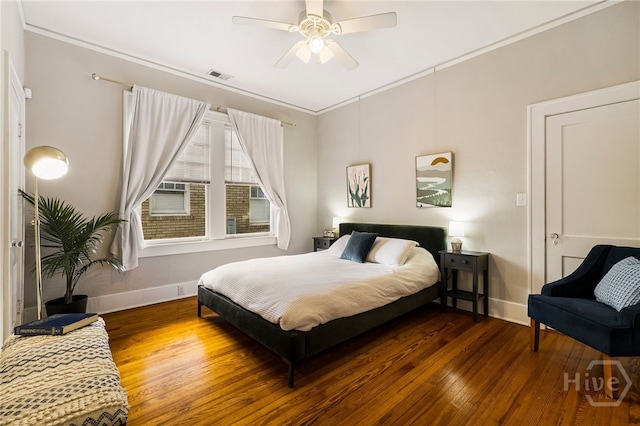 316 E 51st St, Savannah, GA 31405 - bedroom featuring ornamental molding, wood finished floors, and a ceiling fan