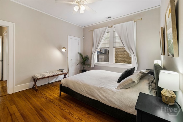 316 E 51st St, Savannah, GA 31405 - bedroom with wood finished floors, ornamental molding, and a ceiling fan