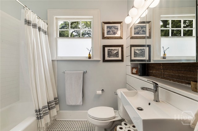 316 E 51st St, Savannah, GA 31405 - bathroom featuring toilet and shower / bath combo with shower curtain