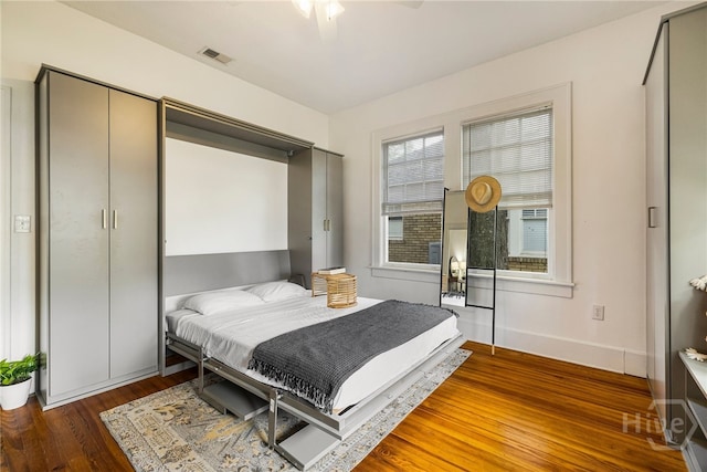 316 E 51st St, Savannah, GA 31405 - bedroom with wood finished floors and baseboards